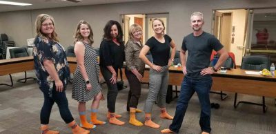 RISE Office party Orange Socks day